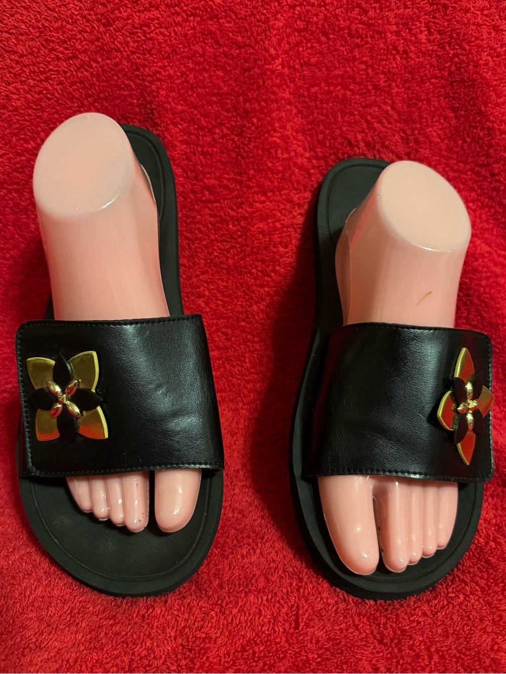 Michael Kors Black Slide Sandals with Gold Floral Medallion